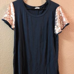 Navy blue tee shirt with gold sparkle sleeves